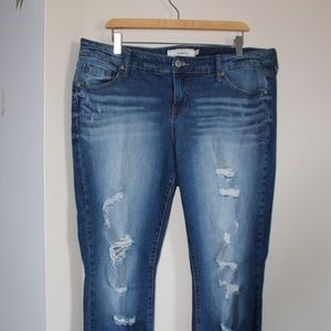 TORRID MID RISE DISTRESSED JEANS